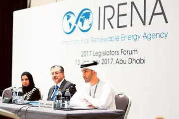 Dr Amal Abdullah Al Qubaisi, Federal National Council Speaker; Dr Thani Ahmad Al Zeyoudi, Minister of Environment and Climate Change; and Adnan Z. Ameen, Director-General of Irena, during the agency’s 2017 Legislators Forum in Abu Dhabi yesterday.