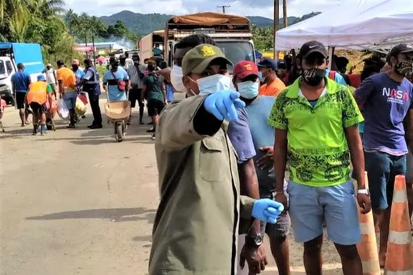 Fiji military directing people at a COVID-19 testing centre in the Lami-Suva-Nausori containment area.