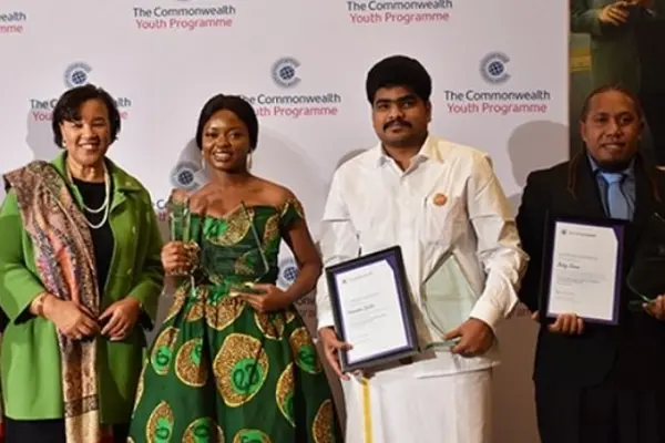 Bobby Siarani, standing far right, is one of the four winners of the Commonwealth Youth Award.