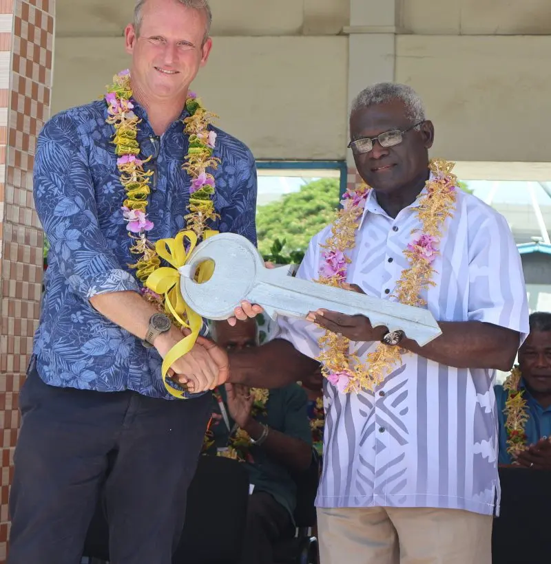 Australian High Commissioner to Solomon Islands His Excellency Rod Hilton hands over key to Prime Minister Manasseh Sogavare.