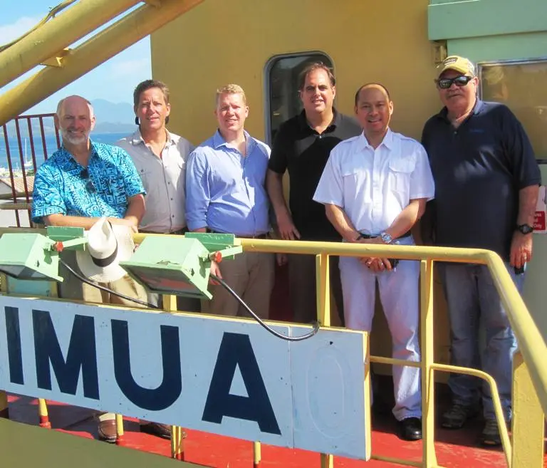 (Left to Right) Jonathon Ogle, division manager for Matson, Glenn Bennett, Managing Director of Silentworld, Craig Vegar, Sales manager for Matson, Meyric Slimming, CEO Silentworld, the Captain of the Imua, Captain Glorioso and Rusty Leonard, Matso’s head of Stevedoring.