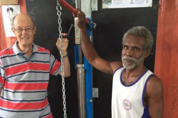 Dr Etherington with Peter, a key coconut oil producer in the Solomon Islands.