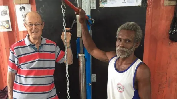 Dr Etherington with Peter, a key coconut oil producer in the Solomon Islands.