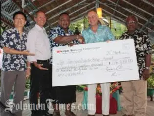 L-R, Ken Kwan, Sir Thomas Chan, Deputy PM Maelanga, H.E Ingruber and Fr John Lamani.