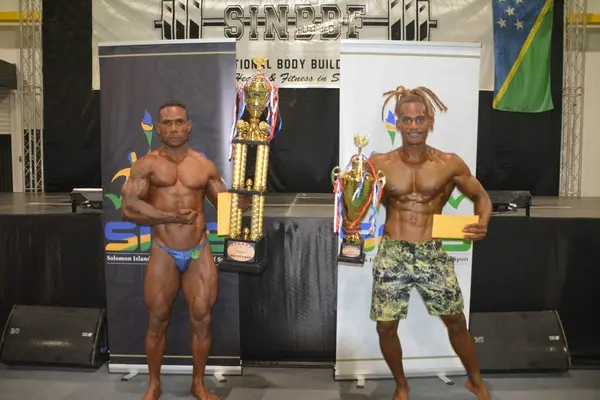 2022 SINBBF Bodybuilding Championship overall winners. Mr Solomon Is. Bodybuilding - Barnabas Waqa (L) and Mr Solomon Is. Physique - Junior Billy Oge (R) with their awards.