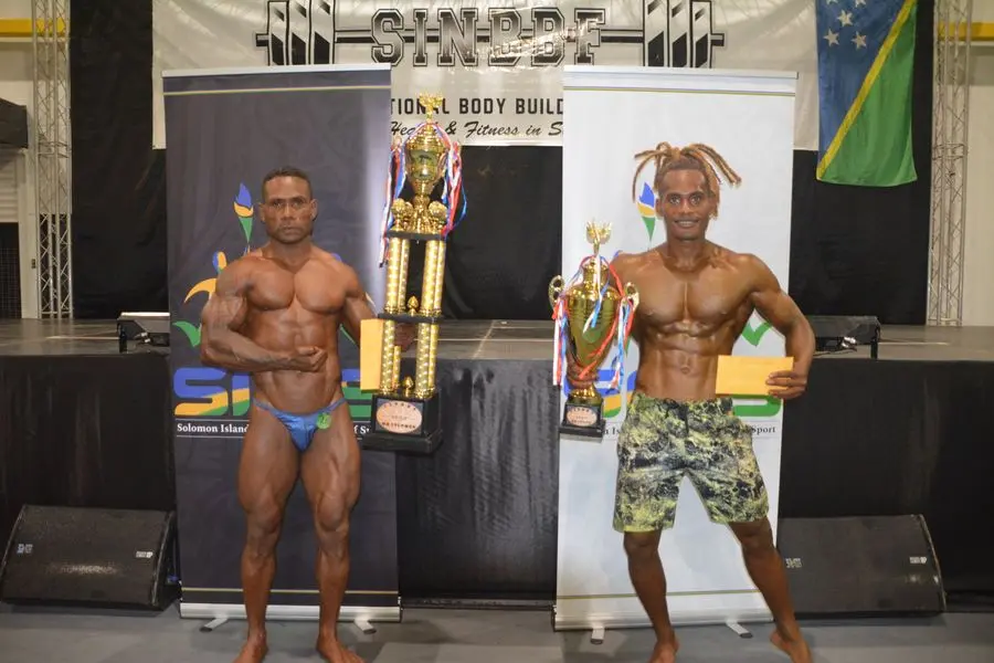 2022 SINBBF Bodybuilding Championship overall winners. Mr Solomon Is. Bodybuilding - Barnabas Waqa (L) and Mr Solomon Is. Physique - Junior Billy Oge (R) with their awards.