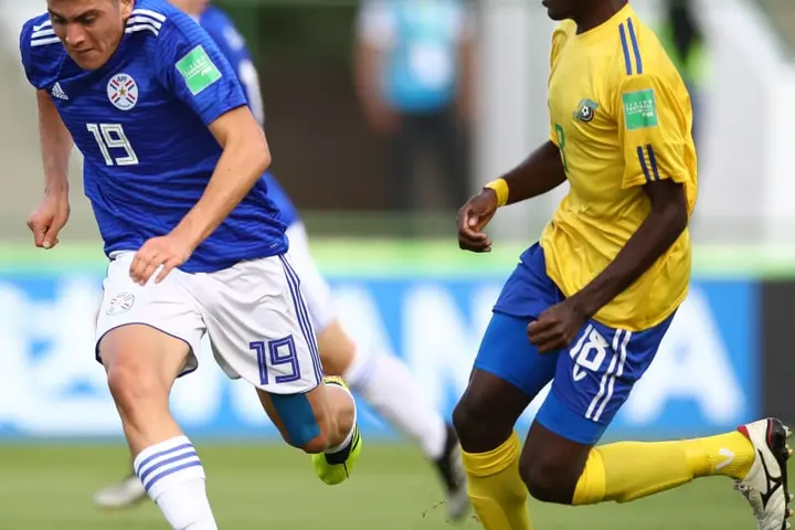Zani Sale of Solomon Islands U-17 tussle for the ball with Fernando Presentado of Paraguay U-17.