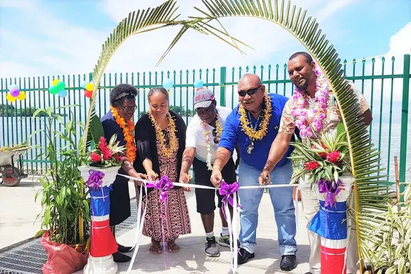 (L-R) Australian High Commission rep Ms Joanne Zoleveke, UNW Alvina Erekali, Contractor Justin Fuo'o, Deputy Premier Randal Sifoni, Provincial secretary Fredrick Fa'abasua at the hand-over.