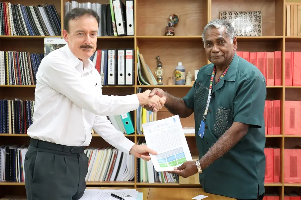 UNDP Country Manager a.i. Tony Cameron and Secretary to the Prime Minister Dr. Jimmie Rodgers approve a new anti-corruption project in Honiara on 4 July 2019.