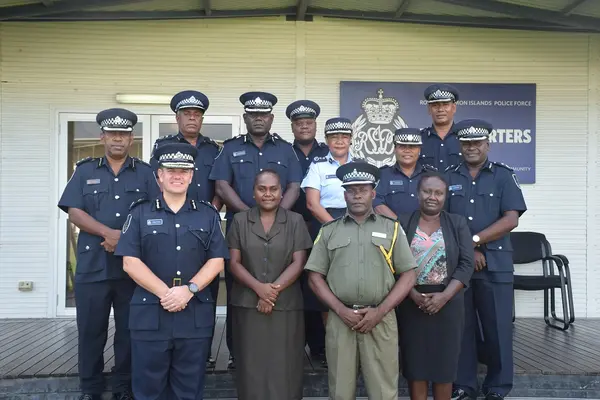 Minister Tanangada and PS Galokale with RSIPF and CSSI executive officers.