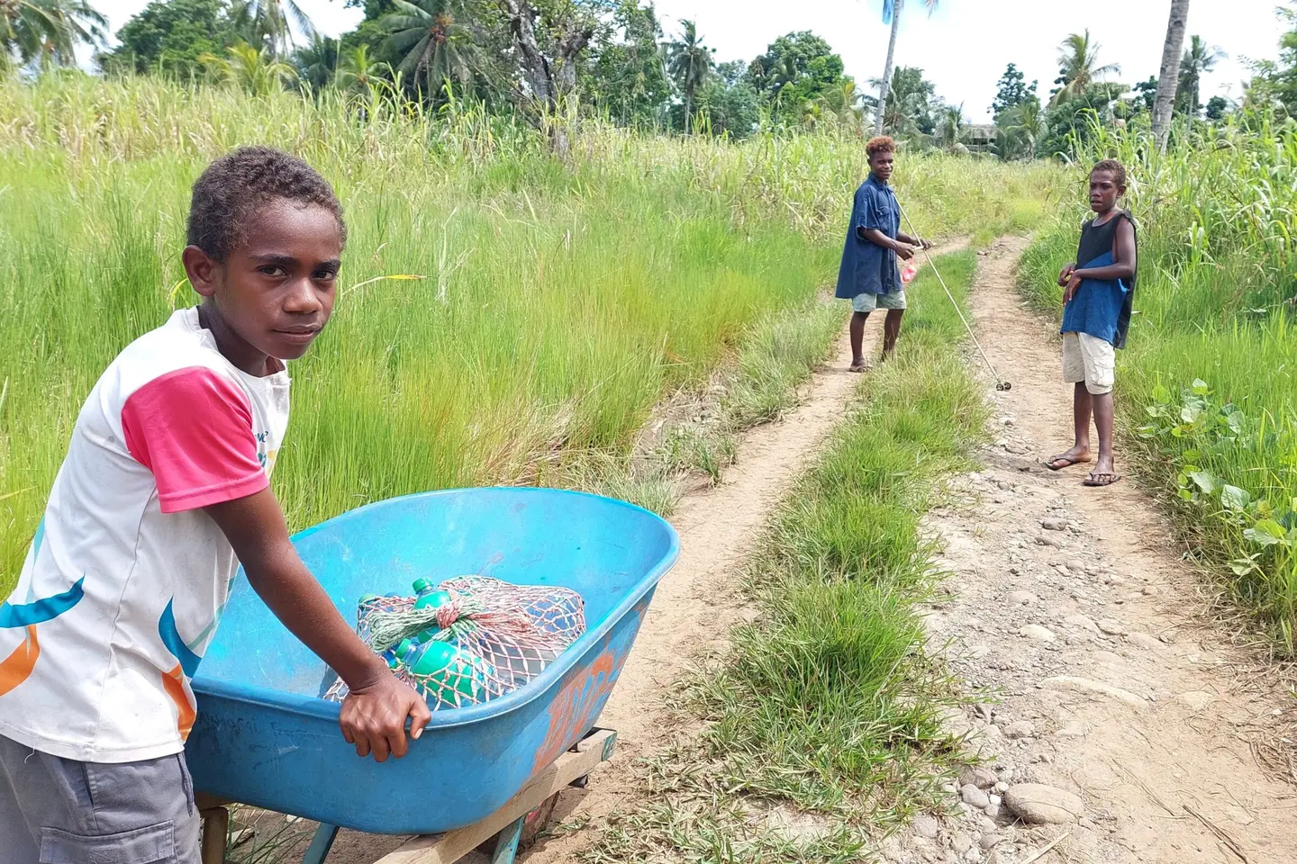 “With the full installation of the water supply system here, I will no longer travel far to collect clean water for drinking and cooking using my wheelbarrow,” says Alphonse Bua.