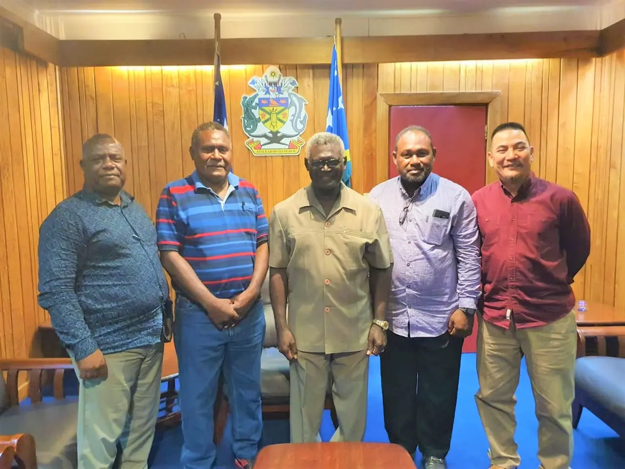 Prime Minister Manasseh Sogavare and other government MPs welcome Hon. Samson Maneka.