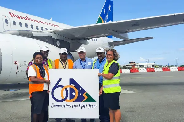 Long-serving Solomon Airlines staff with CEO Gus Kraus – pictured left to right including their time with Solomon Airlines Florence Padabela (35 years),Timothy Neuwa (26 years), John Berry Anga (27 years).