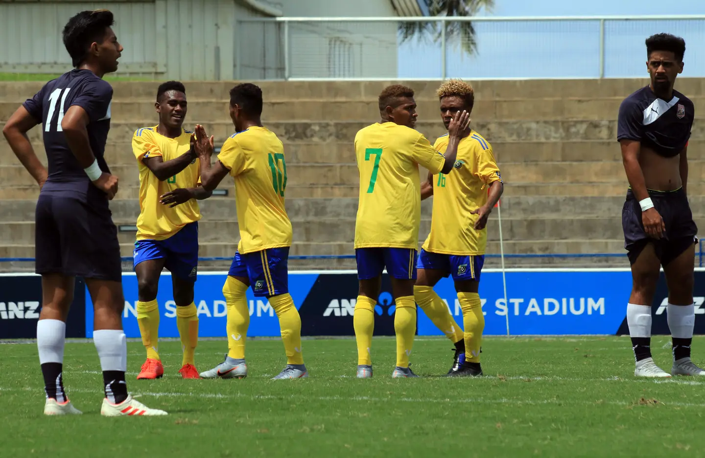 Solomon Islands and New Zealand Take Charge in Group A