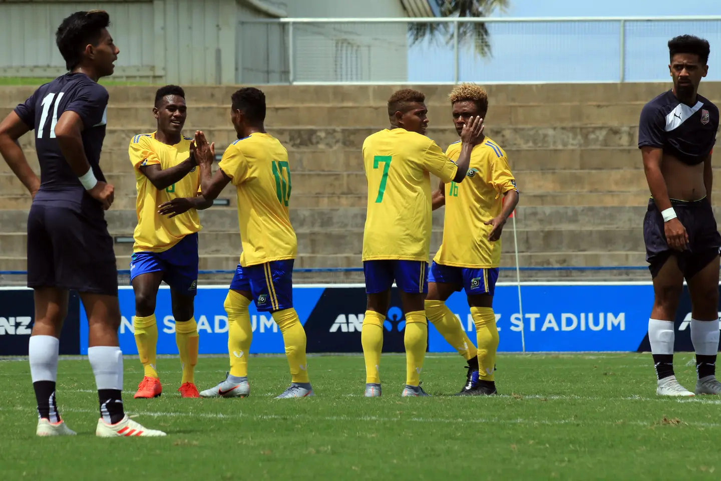 Solomon Islands and New Zealand Take Charge in Group A