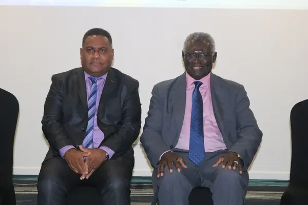 MNPDC Minister Rexon Ramofafia (left) and Prime Minister Manasseh Sogavare pose for photo during the NDS 2016 - 2035 Review launch.