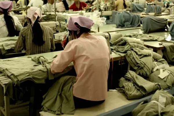 Women are over-represented in lower paid occupations such as these garment workers in Southeast Asia.