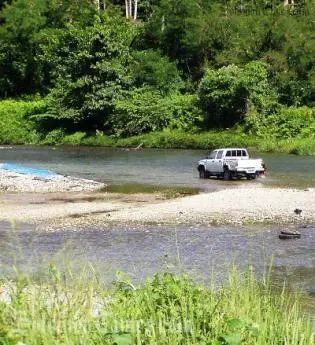 Police still searching for clues to the violent murder of a 25 year old woman found dead at Lunga river.