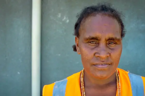 Mary Solo is a CAUSE participant who uses income from the work to build a small business while paying for her children’s school fees.