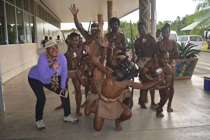 High-profile American actress and comedian Jenifer Lewis receiving a traditional Solomon Islands greeting on arrival at Honiara International Airport.