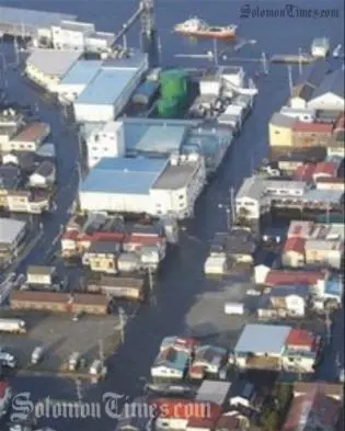 Houses are flooded in seawater in a section of Kesennuma, northern Japan, where waves generated by the earthquake in Chile reached.
