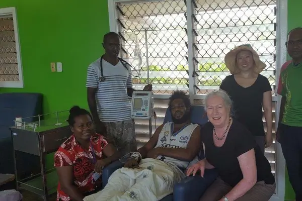The team treating the 34-year-old patient at the hospital in Honiara, Solomon Islands. From left: nurse Meltus, Dr Andrew Soma, the patient, Wendy Spencer, Beth Hua and nurse Stephen.