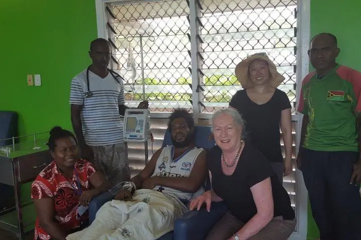 The team treating the 34-year-old patient at the hospital in Honiara, Solomon Islands. From left: nurse Meltus, Dr Andrew Soma, the patient, Wendy Spencer, Beth Hua and nurse Stephen.