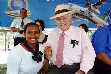 The late Laurie Crowley with a staff of Solomon Airlines during his recent visit.
