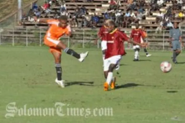 Coleman Makau, left, fires one for Makuru, giving Gizo United 4-1 lead. 
