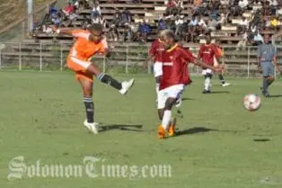Coleman Makau, left, fires one for Makuru, giving Gizo United 4-1 lead.