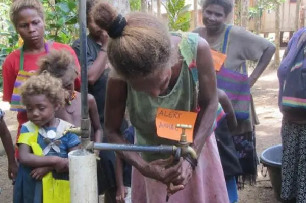 Women caretakers in Veravoulu village practising how to repair taps.