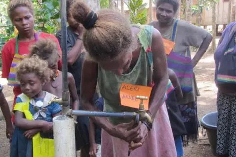Women caretakers in Veravoulu village practising how to repair taps.
