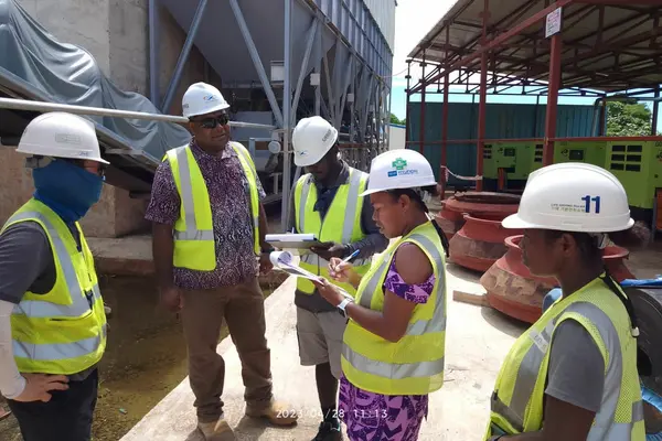 Two female Environment and Biodiversity officers of HEC actively participating in a site inspection.