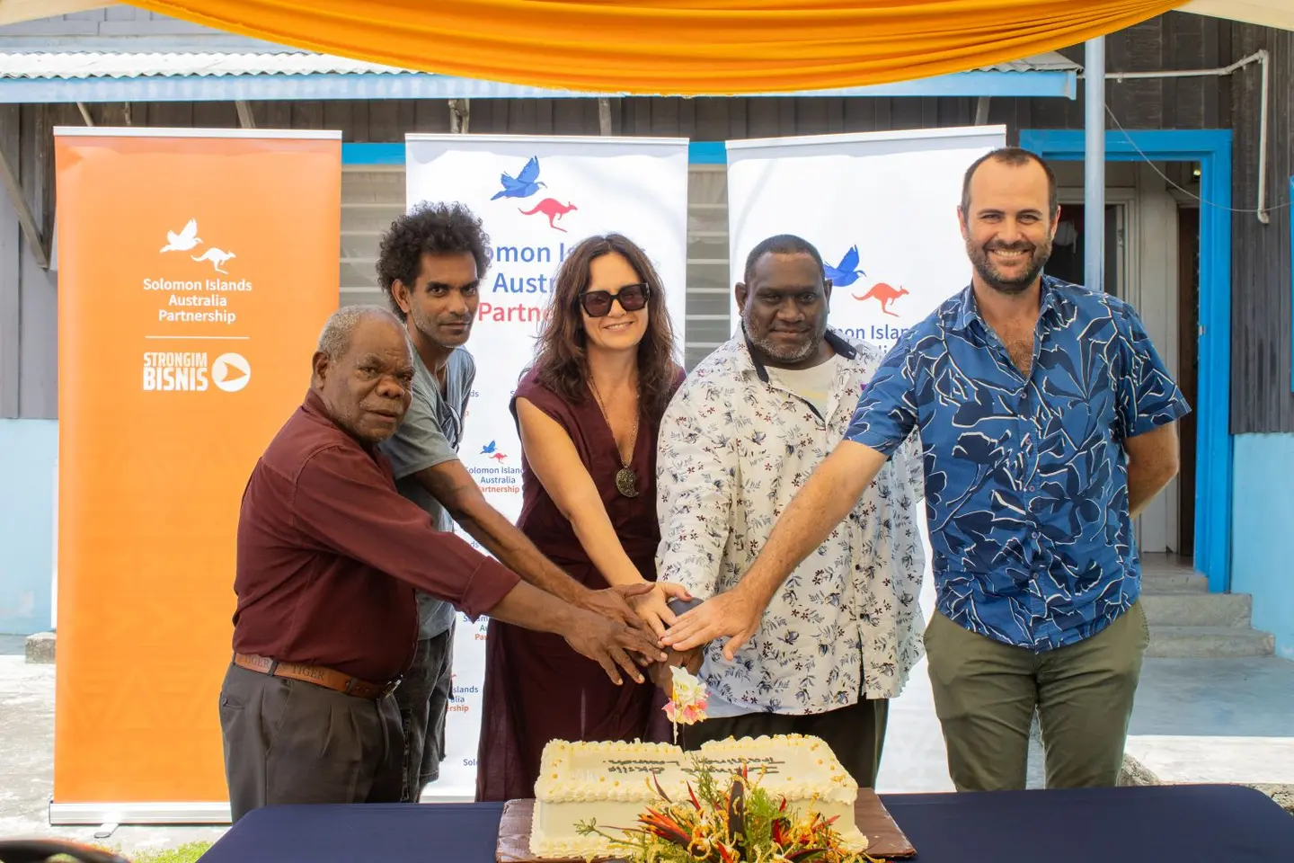 William Rowell, First Secretary - Economic at the Australian High Commission (far right) with Roylex Sitana of Smart Technology, Dina Karic of Strongim Bisnis, Claude Ivupitu, Vice President of the Solomon Islands Deaf Association, and Casper Fa'asala of the National Development Forum Solomon Island