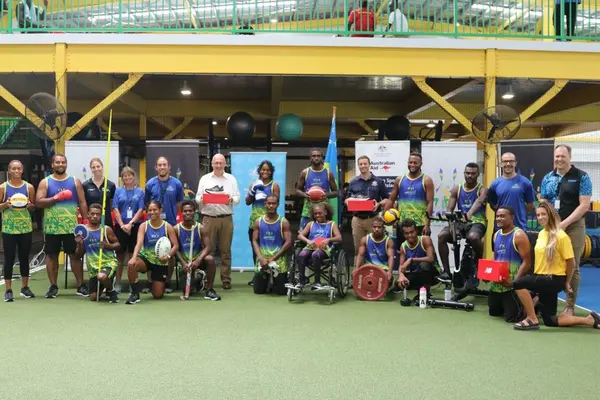 Australian High Commissioner hands over new training shoes to Solomon Islands Pacific Games athletes at SINIS.