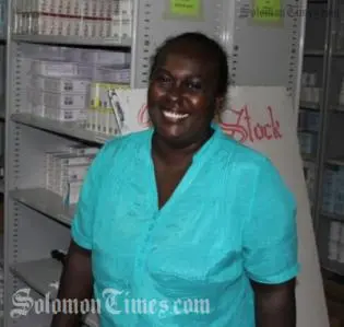 Ms. Zinihite at work in the National Referral Hospital.