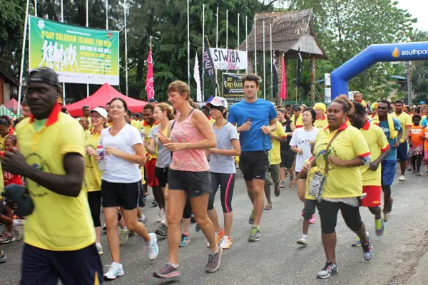 Runners and walkers breaking out at the start of last year’s event.