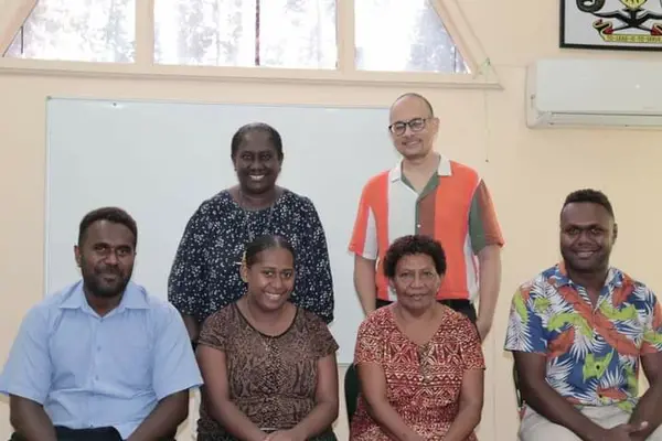 Back L to R. MHMS Permanent Secretary Mrs. Pauline McNeil, Wayne Irava World Bank Health Specialist/Economist. Front L to R. Newly recruited PMU staff Philip Bukah, Unity Kofana, Louisa Fakaia and Jahreth Limarii.