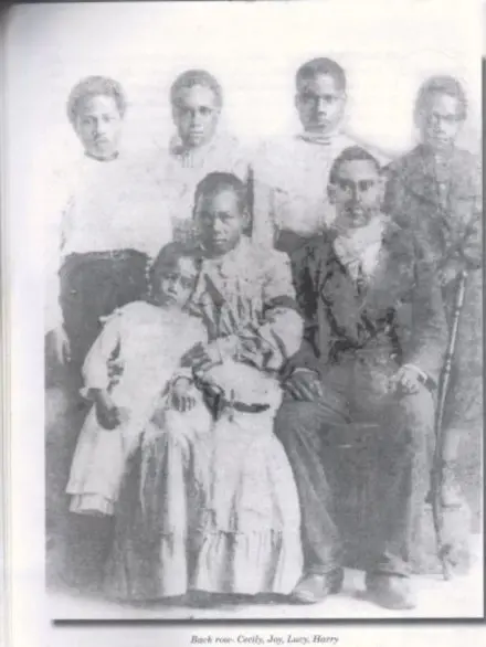 John Fatnouna Kwailiu (seated, right) and family.