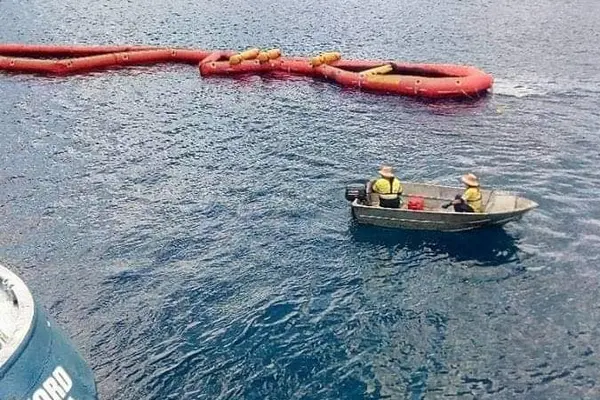 Clean up efforts after the oil spill off Rennell Island in Solomon Islands.
