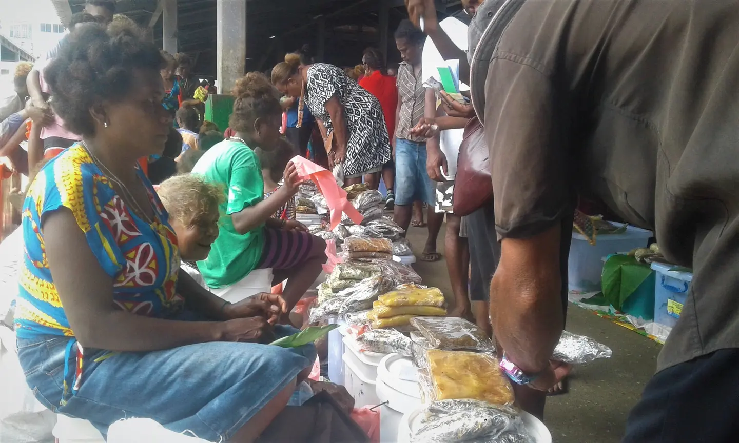 Doreen Biku selling cooked food at the central market in Honiara.