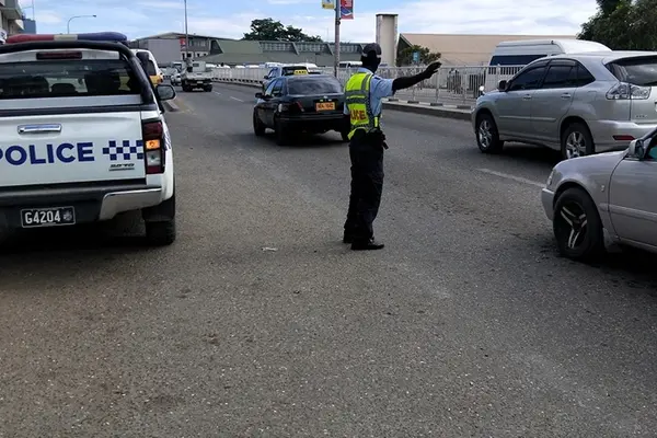 An RSIPF officer control traffic during the operation.