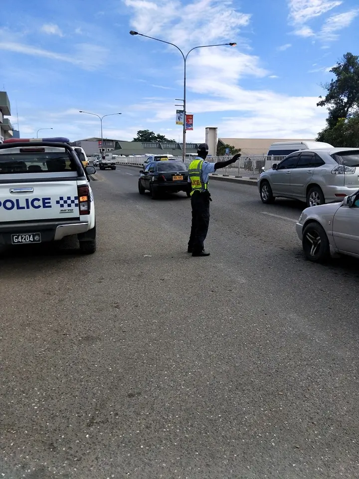 An RSIPF officer control traffic during the operation.