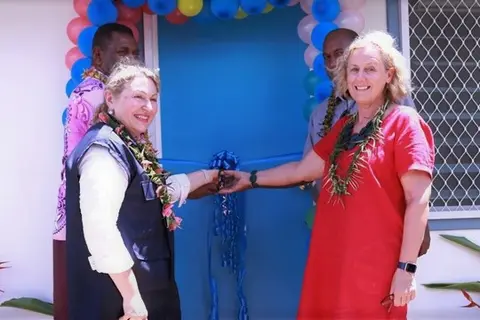 Ribbon cutting to officially open the safe space. WHO Representative Dr Sevil Huseynova (front left), Julie McCallum, Counsellor for Human Development representing the Australian High Commission (front-right) and MHMS Supervising DSHI Mr Michael Larui (back left) and GP Health Director Dr Joel Denty (back-right).