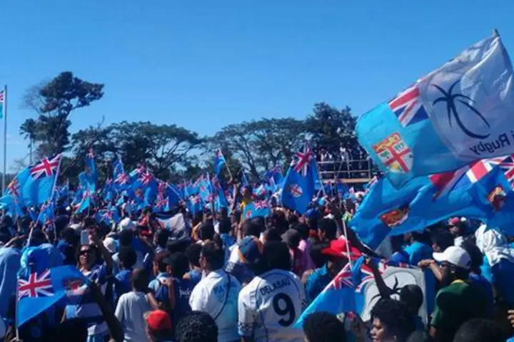 The Special Fiji 7s team Gold Medal celebration march is underway and thousands of people have joined the team for the walk to the ANZ Stadium from Flea Market.