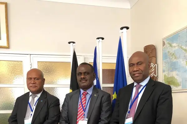Hon. Jeremiah Manele, Minister for Foreign Affairs and External Trade [centre] at the Solomon Islands Embassy in Brussels, with Trade Commissioner Mr Joseph Ma’ahanua and Ambassador Mose.