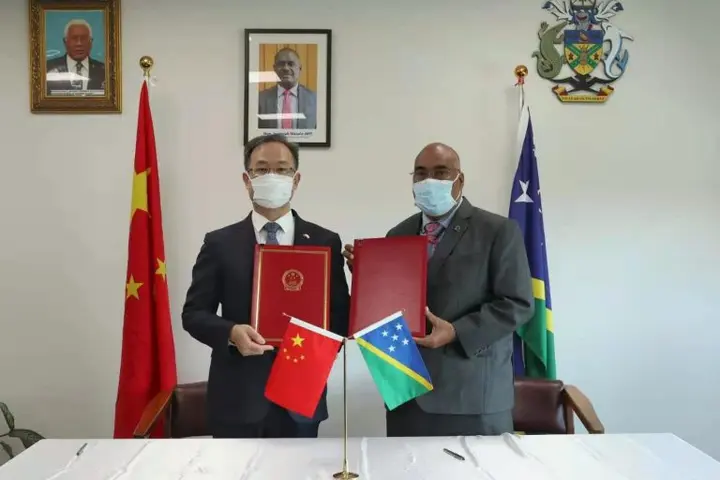 Chinese Ambassador H.E. LI Ming and Permanent Secretary of the Ministry of Foreign Affairs and External Trade Mr. Colin Beck have initialed the Framework Agreement Between the Government of the PRC and the Government of Solomon Islands on security cooperation.