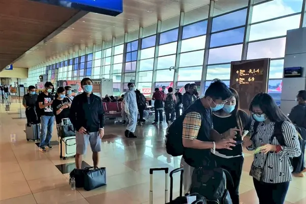The group of 68 Malaysians upon their arrival at the Kuching International Airport before they were taken to the quarantine centres, March 16, 2021.