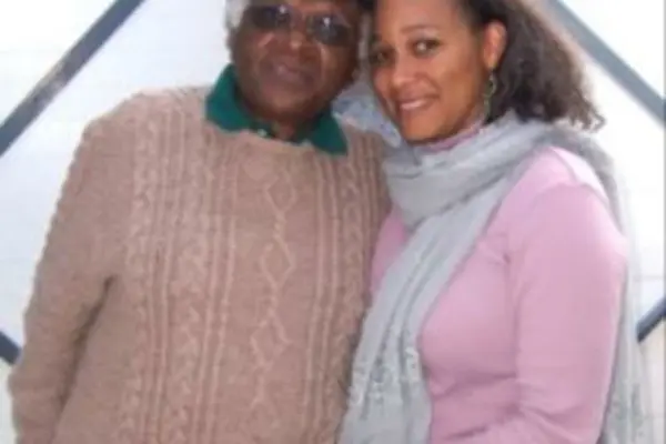 Karen Hayes with the retired Archbishop Desmond Tutu. 