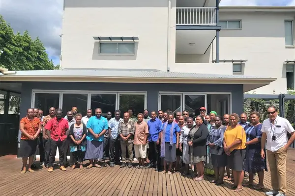 Group photo of NHEOC IC Dr Nemia Bainivalu, training facilitators including MHMS Advisor Dr Yogesh Choudhri and participants.